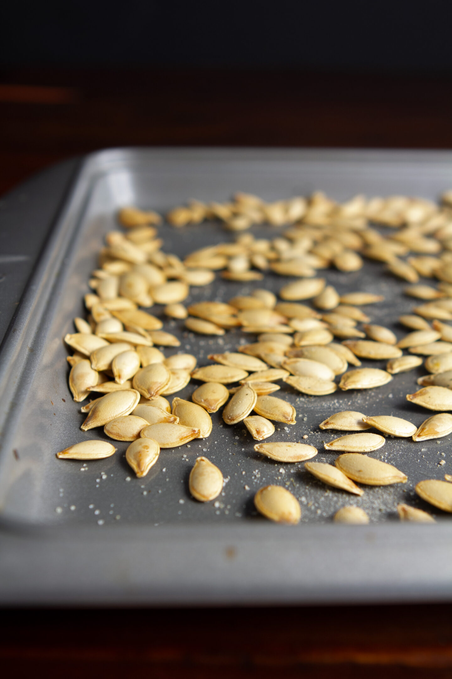 Roasted Pumpkin Seeds on Baking Sheet