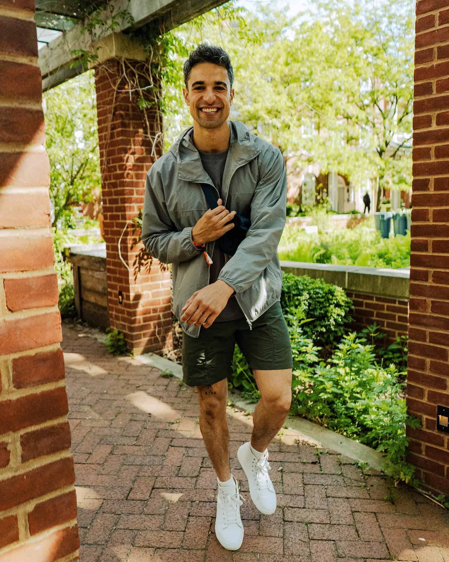 Man wearing parka and other athleisure clothes