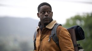 'Paradise' Season 2 stars Sterling K. Brown, shown here in a brown coat with a backpack, outside the bunker