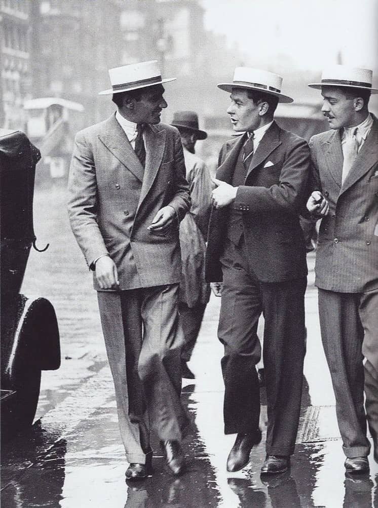 three men in 1920s wearing suits and hats