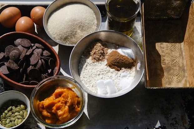 Ingredients for baking pumpkin bread arranged on a counter