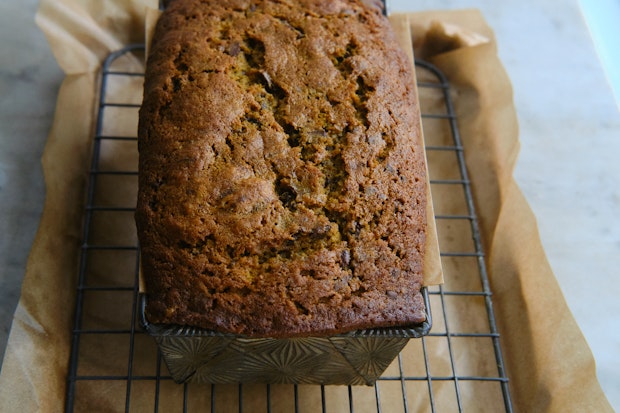 Pumpkin bread on a cooling rack just after baking