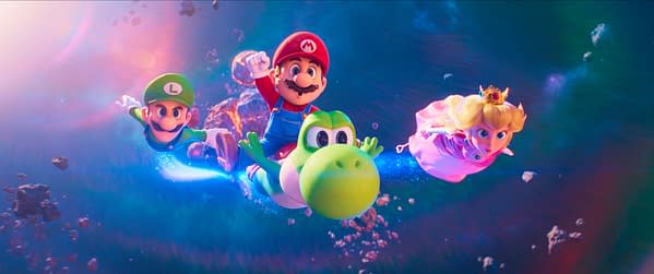 Animated characters Mario, Luigi, Yoshi, and Princess Peach are soaring through a colorful, cosmic backdrop filled with asteroids. The scene captures a sense of adventure and excitement.