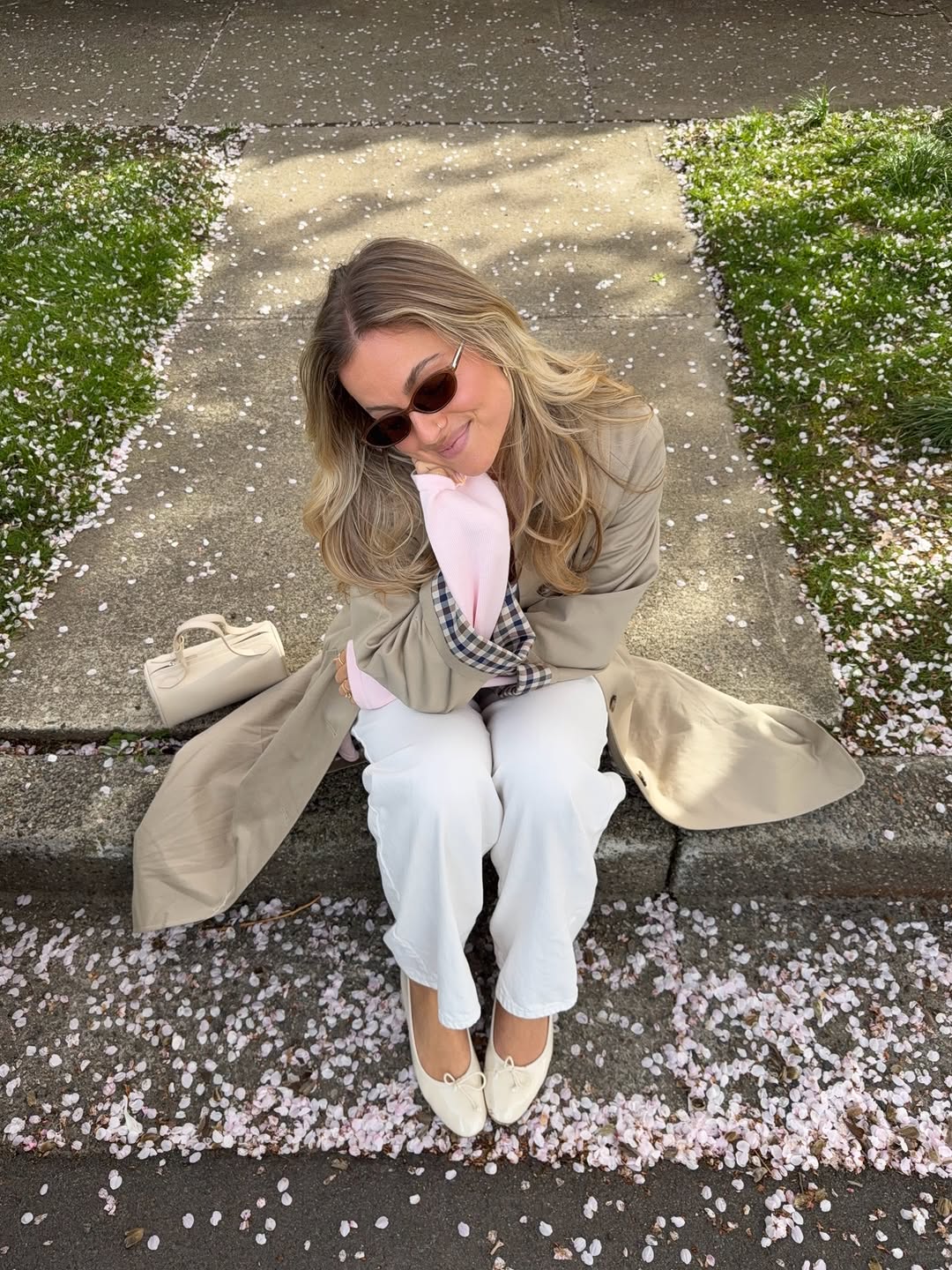 An image of a woman wearing white flats, shoe trend for spring 2026.