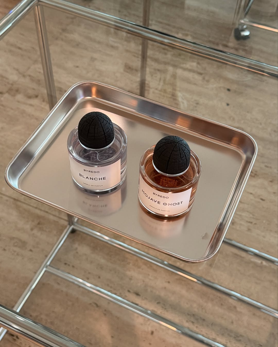 Byredo fragrances on a lab tray.