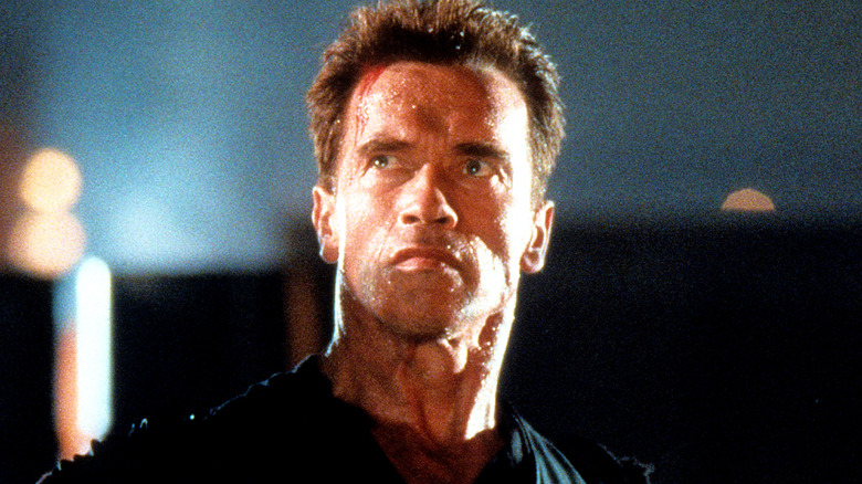 John (Arnold Schwarzenegger) looking angry in 