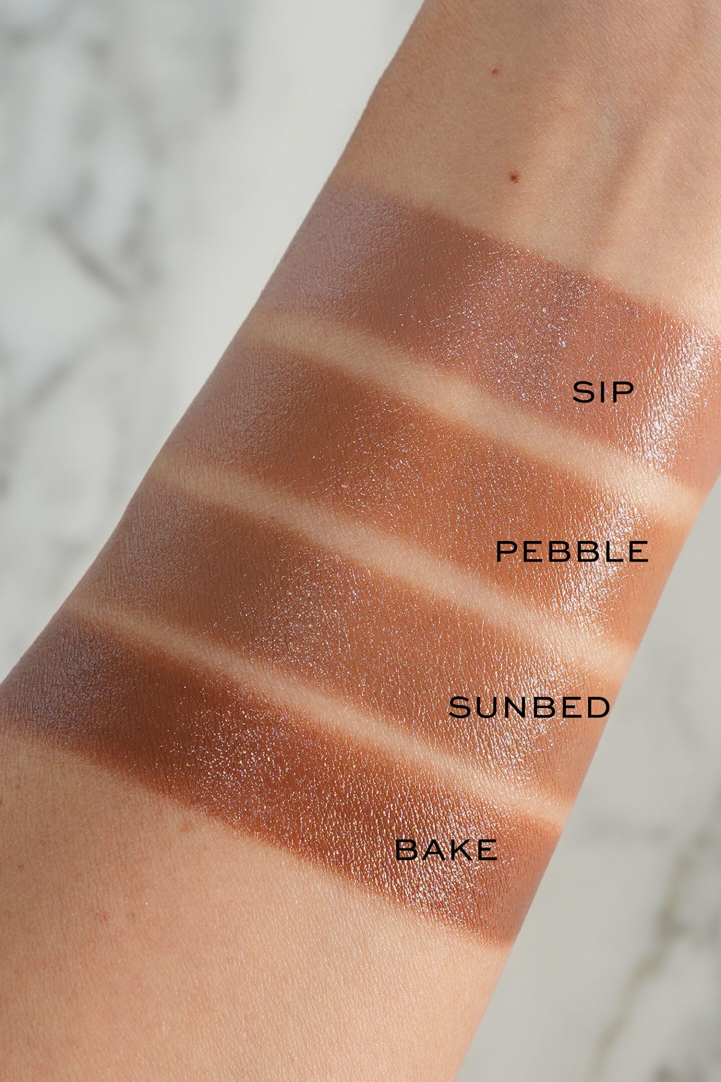 Rhode Summer 2026 Pocket Bronze swatches Via The Beauty Lookbook Blog