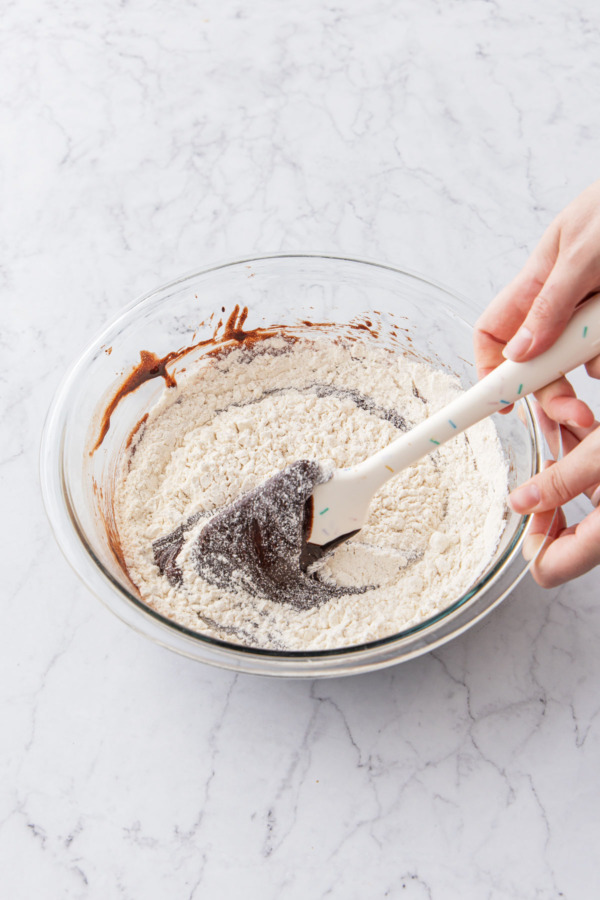 Fold in dry ingredients with a rubber spatula.