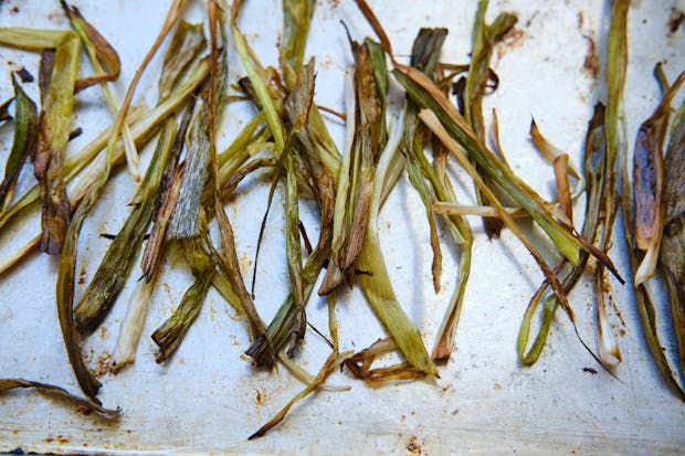 scallions roasted on a baking sheet