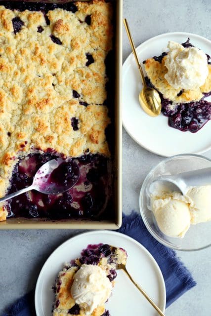 a small portion of cobbler spooned out of pan.