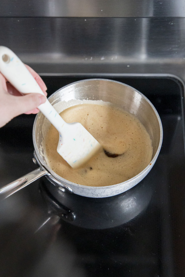 Brown butter just about finished, foam on top but you can see the slightly golden brown color of the brown butter.
